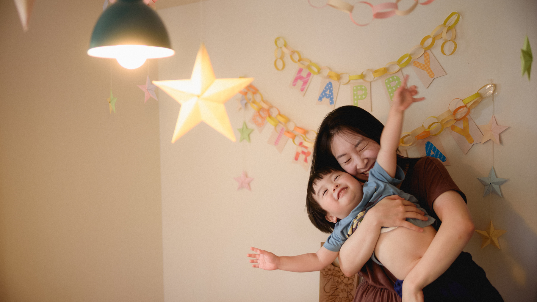 Japanese mother hugs child